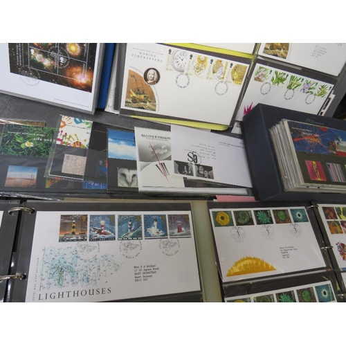 74 - SIX ALBUMS OF FIRST DAY COVERS, mainly 1980s / 1990s, together with a Royal Mail Millenium collectio... 