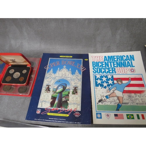 77 - AN ALBUM OF FIRST DAY COVERS, a Superbowl XXII programme, an American bicentenial cup programme 1976... 