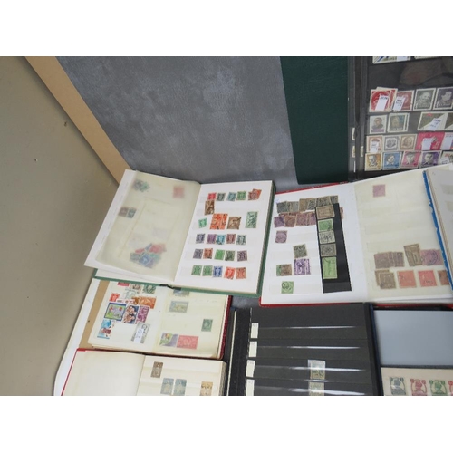 8 - THIRTEEN STAMP ALBUMS / STOCK BOOKS / FIRST DAY COVER ALBUMS, containing mainy Indian, Russian, Swis... 