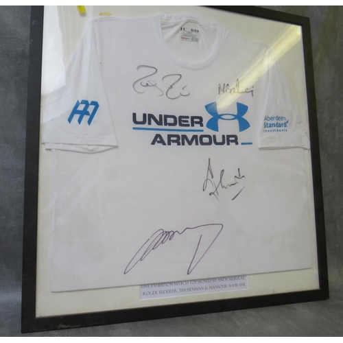 80 - A FRAMED UNDER ARMOUR T-SHIRT, signed at a live exhibition tennis math by Roger Federer, Tim Henman,... 