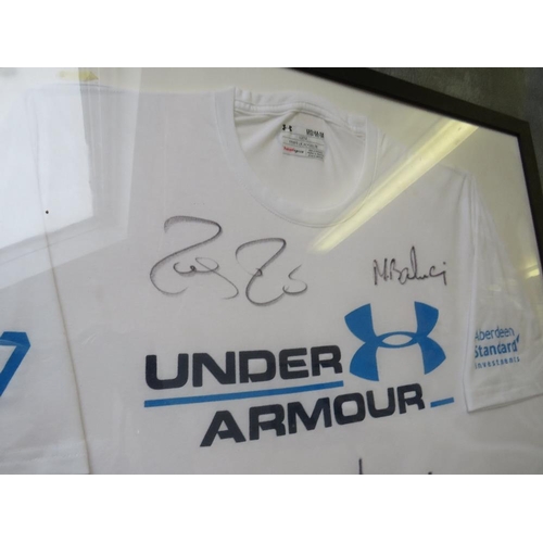 80 - A FRAMED UNDER ARMOUR T-SHIRT, signed at a live exhibition tennis math by Roger Federer, Tim Henman,... 