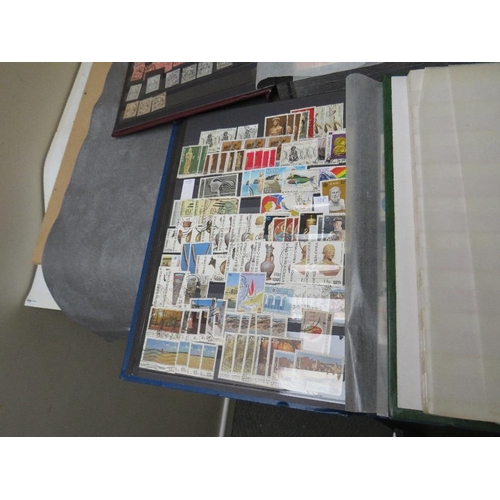 9 - TEN STAMP ALBUMS / STOCK BOOKS,containing mainly Swiss and Commonwealth stamps