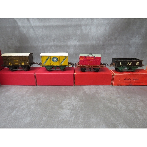 171 - TWENTY FOUR BOXED HORNBY O GAUGE ROLLING STOCK, to include tank wagon, brake van, low sided wagon PO... 