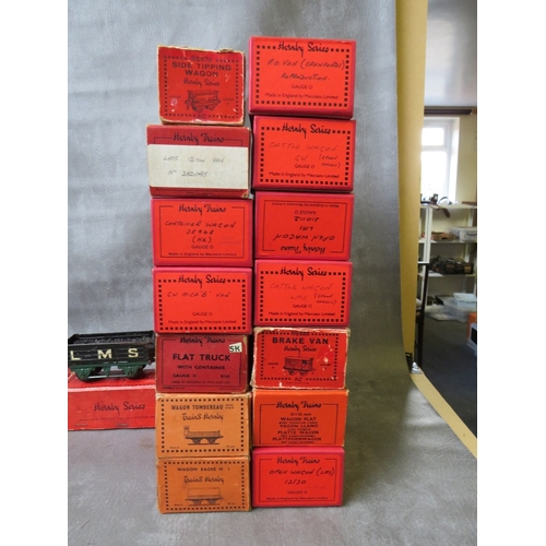 171 - TWENTY FOUR BOXED HORNBY O GAUGE ROLLING STOCK, to include tank wagon, brake van, low sided wagon PO... 