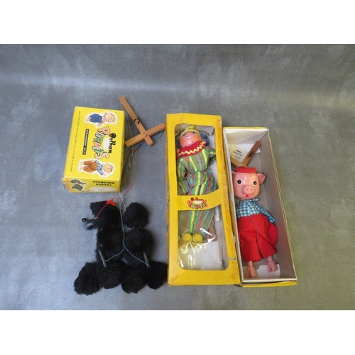 182 - THREE PELHAM PUPPETS, rare boxed 'Perky The Pig', boxed clown and boxed black poodle, FOUR UNBOXED P... 