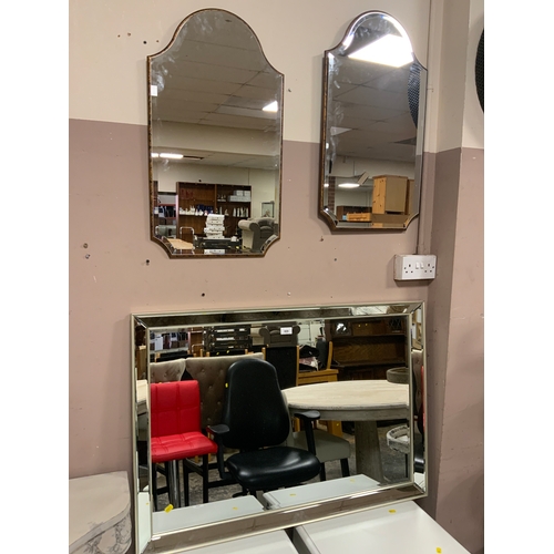 809 - A large modern rectangular mirror 70 x 100 cm, together with a pair of smaller rectangular mirrors. ... 