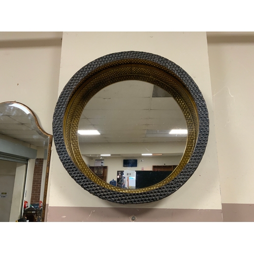 811 - A modern circular metal wall mirror Dia. 50 cm