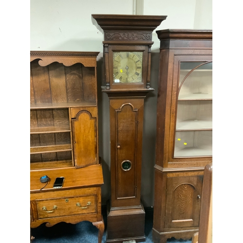 821 - Thomas Brown of Litchborough - An antique oak cased longcase clock with brass face and single finger... 