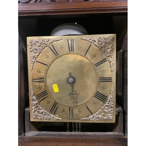 821 - Thomas Brown of Litchborough - An antique oak cased longcase clock with brass face and single finger... 