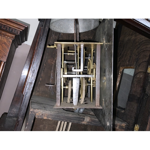 821 - Thomas Brown of Litchborough - An antique oak cased longcase clock with brass face and single finger... 