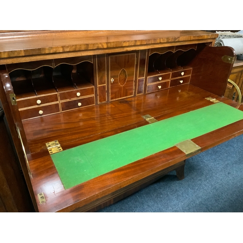 823 - A 19th century mahogany glazed secretaire bookcase, having a fully fitted secretaire drawer, glazed ... 