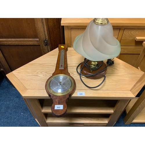 842 - A small barometer and a table lamp. (2)