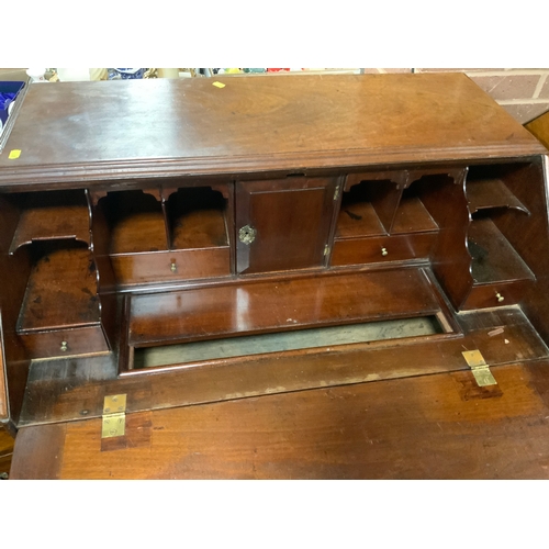 856 - A Georgians mahogany country made bureau with nicely fitted interior, raised on bracket feet H 104 c... 