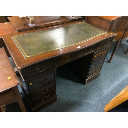 863 - A reproduction mahogany twin pedestal desk with leather top W 121 cm