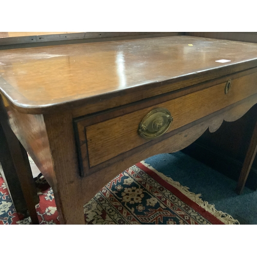 864 - An antique oak crossbanded single drawer side table W 97 cm