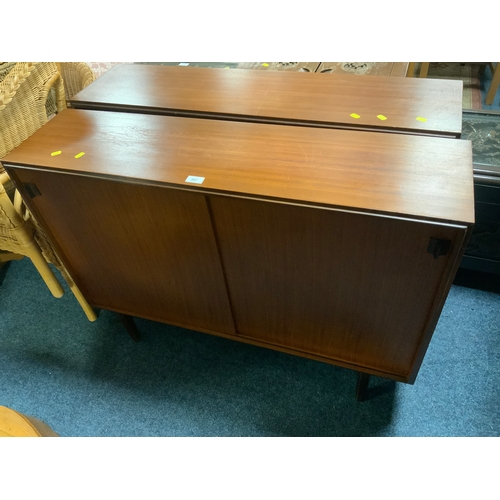 867 - A near pair of mid century teak bookcases, once with sliding doors one with glass doors W 107 cm