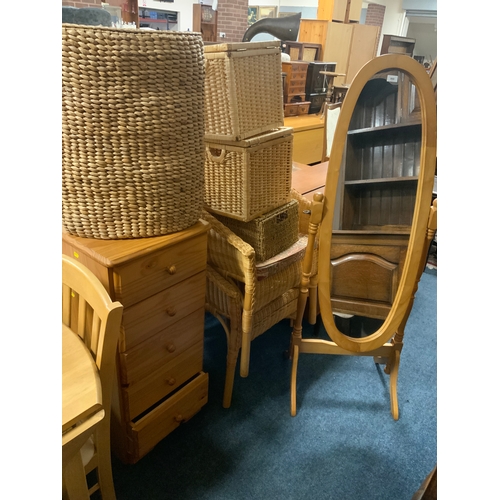 868 - A modern pine effect cheval mirror a honey pine chest and a quantity of wicker chairs and baskets