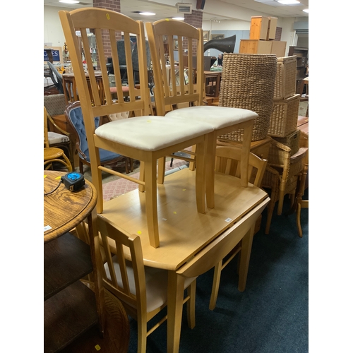 869 - A modern kitchen table and four chairs