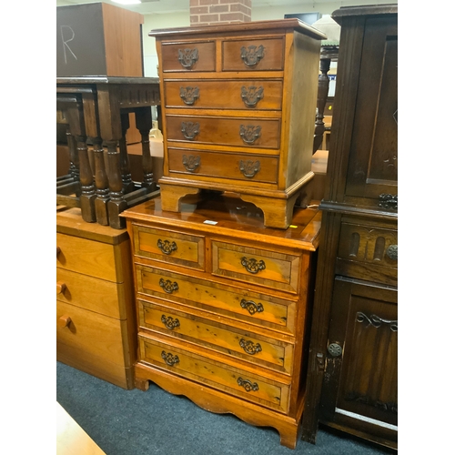 892 - A small yew wood four drawer chest W 63 cm together with a miniature similar chest W 42 cm. (2)