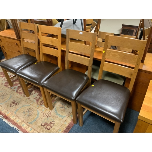 896 - A set of four modern oak dining chairs