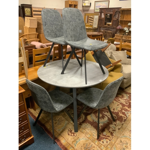 904 - A modern circular show home style table with four chairs