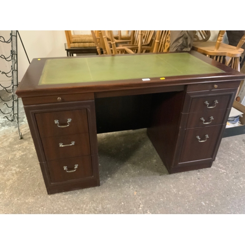 918 - A reproduction twin pedestal leather topped desk W 122 cm