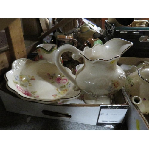 319 - Four trays of ceramics and sundries to include beer steins and jugs etc