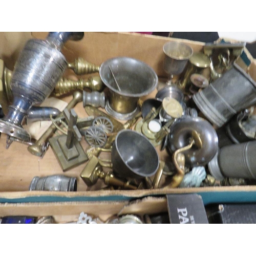 334 - Two trays of assorted metal ware to include brass candlesticks etc