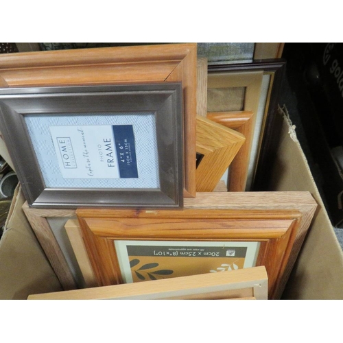 368 - A tray of sundries to include books and picture frames