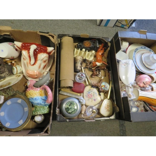 373 - Three trays of mixed collectables to include Beswick, cast iron items, china and glass etc