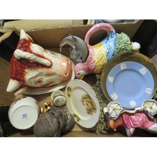 373 - Three trays of mixed collectables to include Beswick, cast iron items, china and glass etc