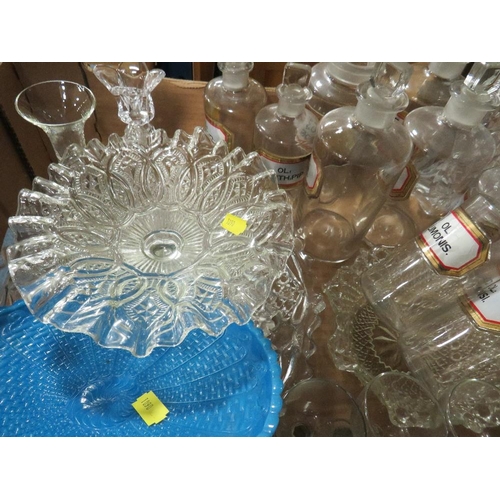 379 - A tray of assorted glassware to include chemist jars