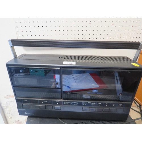 395 - A Mitsubishi video cassette recorder