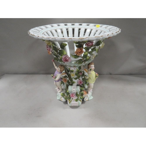 413 - A modern reproduction cherubic table ceramic centerpiece