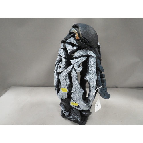 420 - An Edge sculpture by Matt Buckley of a penguin with a chick