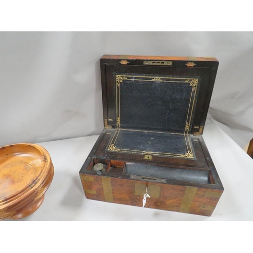 424 - A brass bound walnut type writing slope A/F together with a turned Totara wood bowl