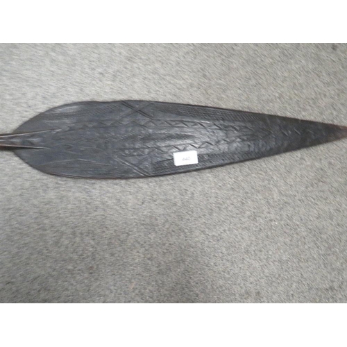 440 - A Polynesian carved wood ceremonial paddle spear, with carved decoration