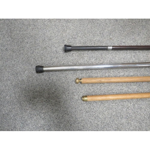 448 - A selection of four walking sticks to include a modern metal one with a Jack Russell head