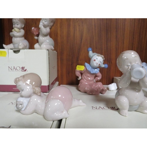 453 - Seven pieces of Nao in original boxes to include two playful elephants