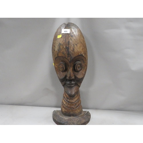 469 - A carved wooden ethnic head