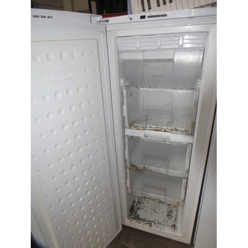 779 - A Beko upright freezer - House Clearance