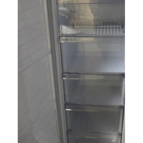 780 - A Beko upright freezer - House Clearance