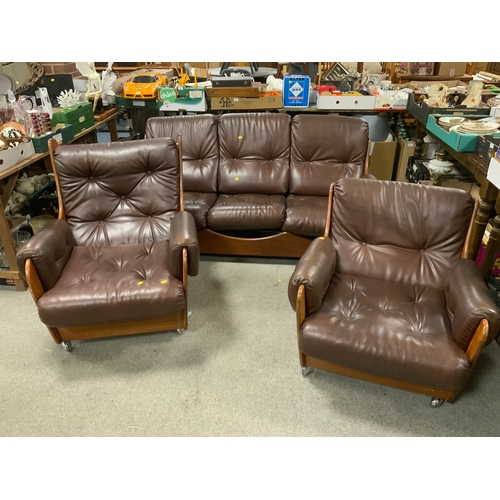 921 - A mid century teak G-Plan three piece suite