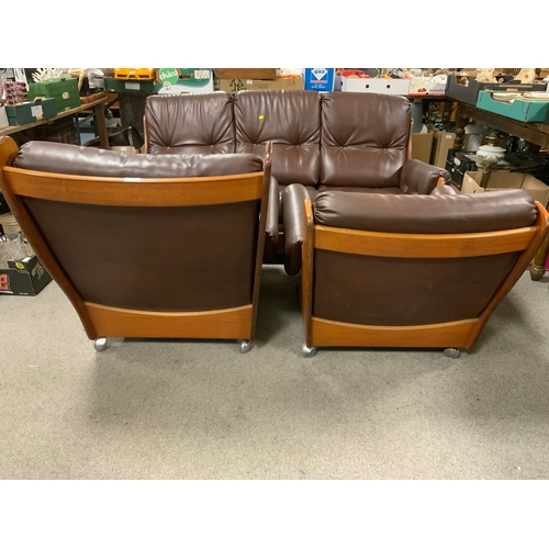 921 - A mid century teak G-Plan three piece suite