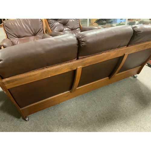 921 - A mid century teak G-Plan three piece suite