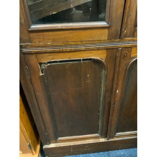 720 - An antique mahogany glazed floor standing display cabinet of small proportions H 197 cm W 78 cm. A/F