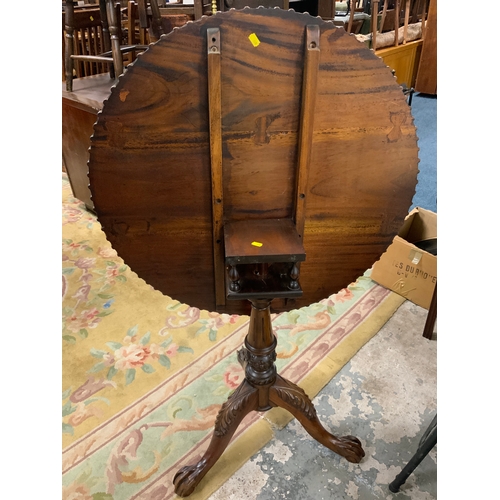 743 - A reproduction mahogany Chippendale style pedestal table with a birdcage mechanism