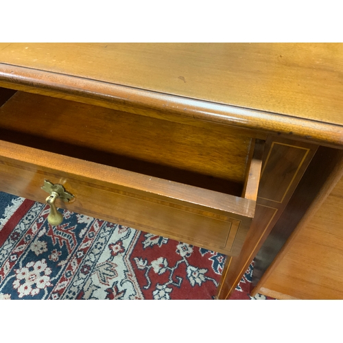 774 - An early 20th century mahogany inlaid two drawer side table W 106 cm