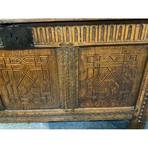 777 - A Georgian oak panelled coffer with unusual inlaid moulding to the front panels W 140 cm