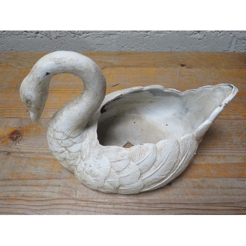 619 - A cast iron swan planter**